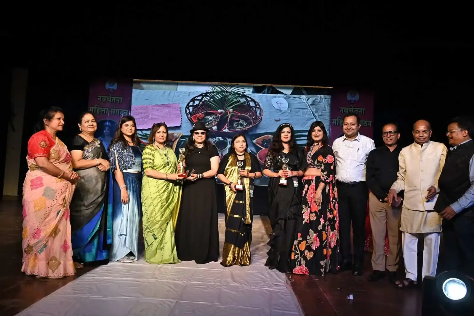 Happy Indian family protected by comprehensive health and life insurance coverage from Sampurn Insurance