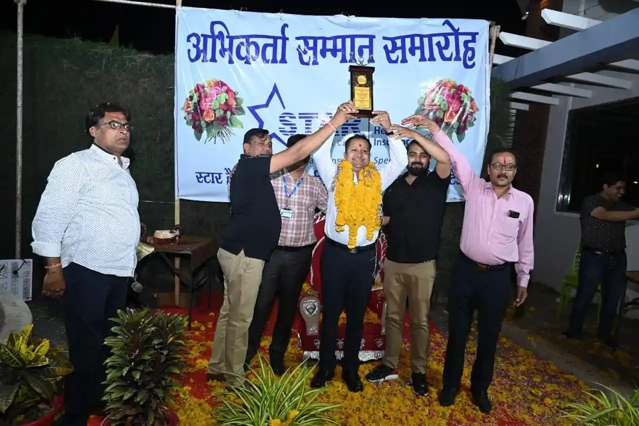 Happy Indian family protected by comprehensive health and life insurance coverage from Sampurn Insurance